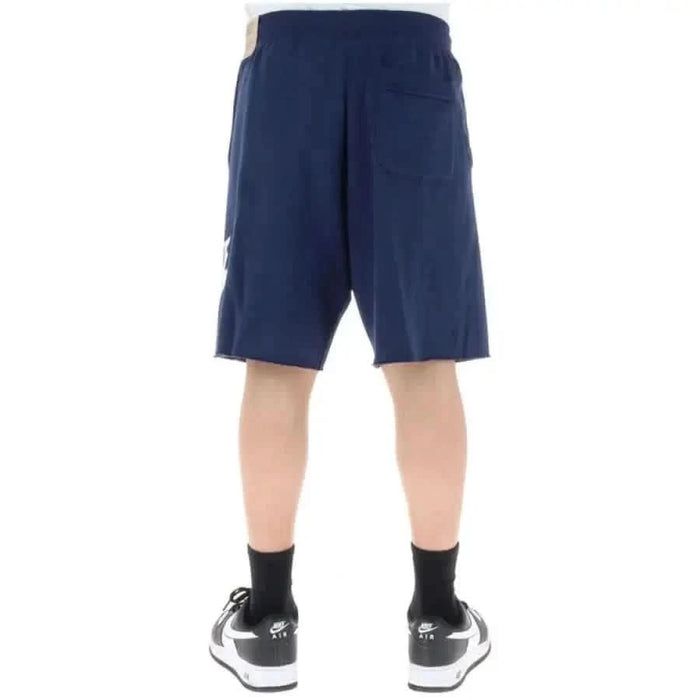 Navy blue Nike Men Shorts with a side pocket, ideal for athletic activities