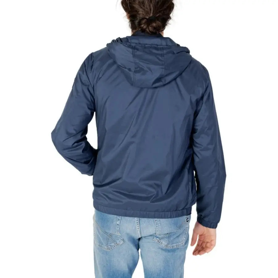 Navy blue hooded jacket by Gas - Gas worn by woman in jeans, viewed from behind