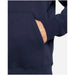 Navy blue Nike hoodie pocket with a hand tucked inside for added comfort and style