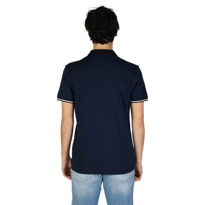 Navy blue Antony Morato polo shirt with white trim styled with light blue jeans