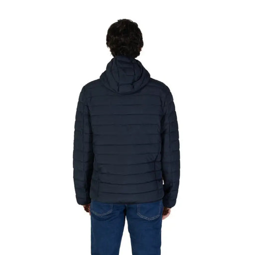 Navy blue quilted puffer jacket with hood displayed from the back for men