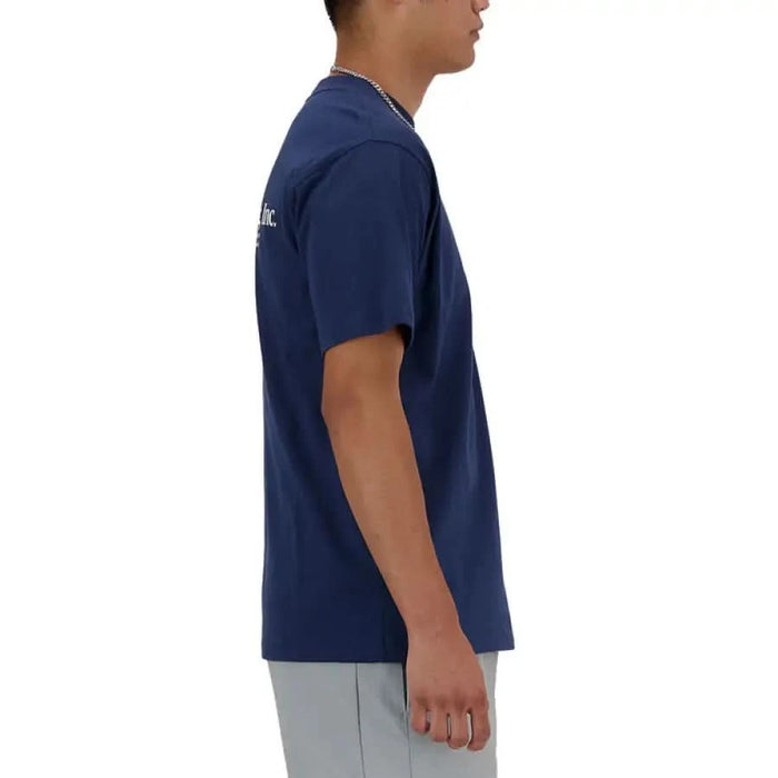 New Balance Men T-Shirt in navy blue color worn by a model with short sleeves