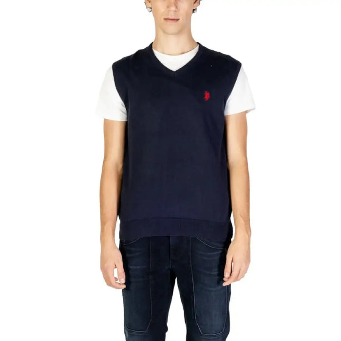 Navy blue US Polo Assn sweater vest with red logo over white t-shirt for men