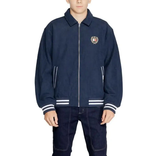 Navy blue varsity jacket with striped ribbing and embroidered crest by Tommy Hilfiger Jeans