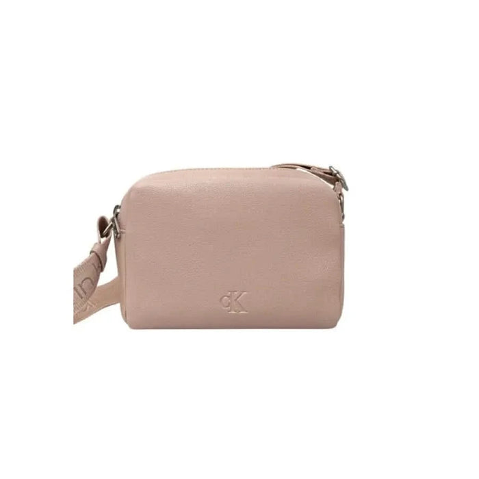 Nude blush leather crossbody bag with silver hardware by Calvin Klein Women