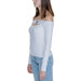 Off-the-shoulder white top and light blue jeans from Tommy Hilfiger Women T-Shirt collection