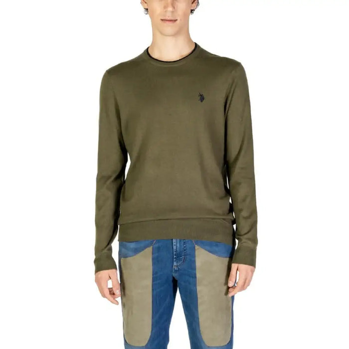 Olive green crewneck sweater with dark emblem from U.S. Polo Assn. Men’s collection