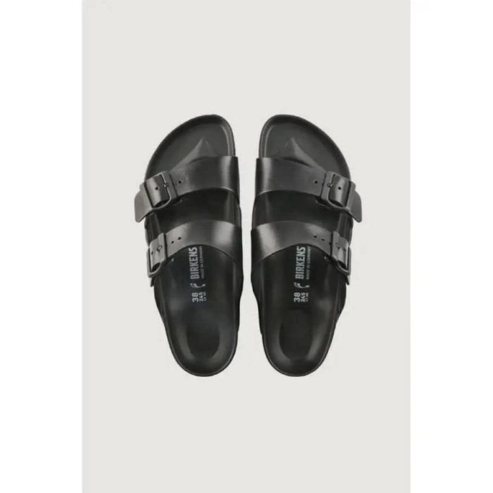 Black Birkenstock-style sandals for men featuring two adjustable straps