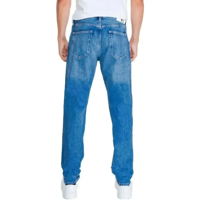 Pair of blue denim jeans from the back for Calvin Klein Jeans Men collection