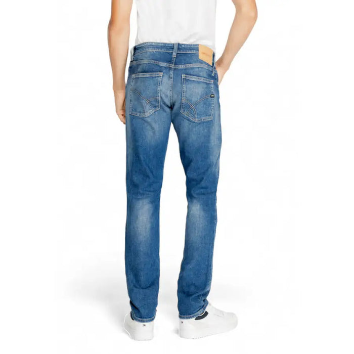 Pair of blue denim jeans from the back, featuring Gas Men Jeans design