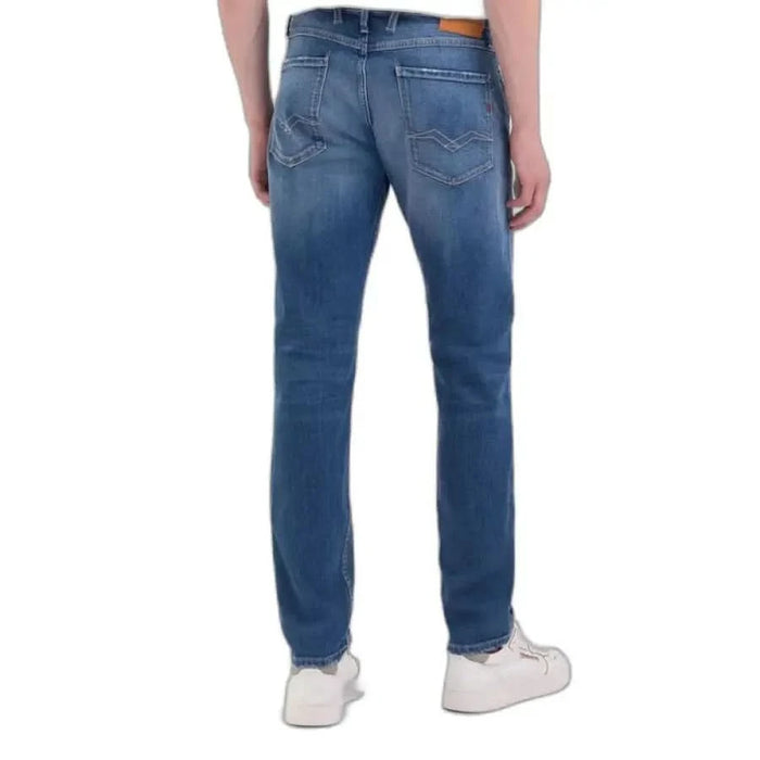 Blue denim jeans from the back featured in Replay Men Jeans collection