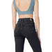 Calvin Klein dark-wash high-waisted women’s jeans with logo on waistband