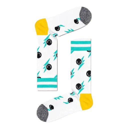 White socks with teal leaf patterns, black dots, yellow accents, and gray cuffs