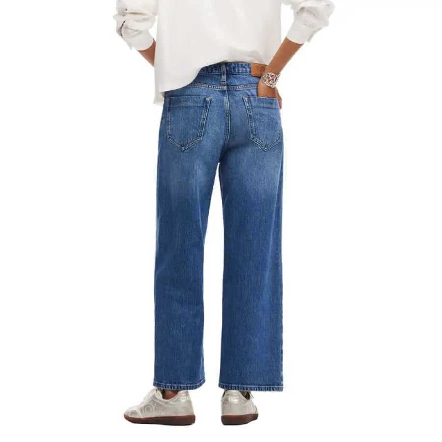 Desigual Women Jeans: Wide-leg blue jeans with white sneakers and a white top