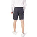 Armani Exchange Men Shorts with white shirt above waistband showcasing stylish dark patterns