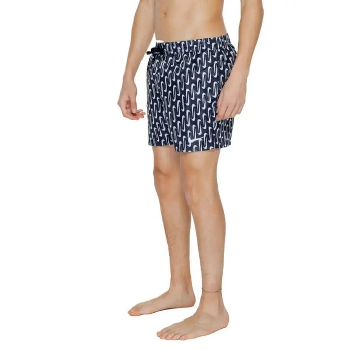 Nike Swim Men Swimwear featuring patterned navy blue and white geometric swim shorts