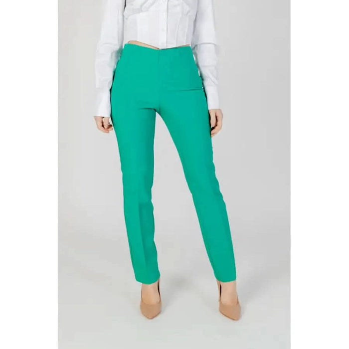 Sandro Ferrone women trousers in emerald green on model