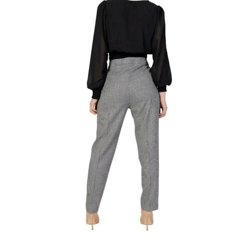 Morgan De Toi women trousers in grey displayed, Toi Morgan stylish attire