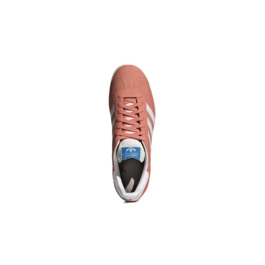 Pink Adidas Women Sneakers with white stripes viewed from above