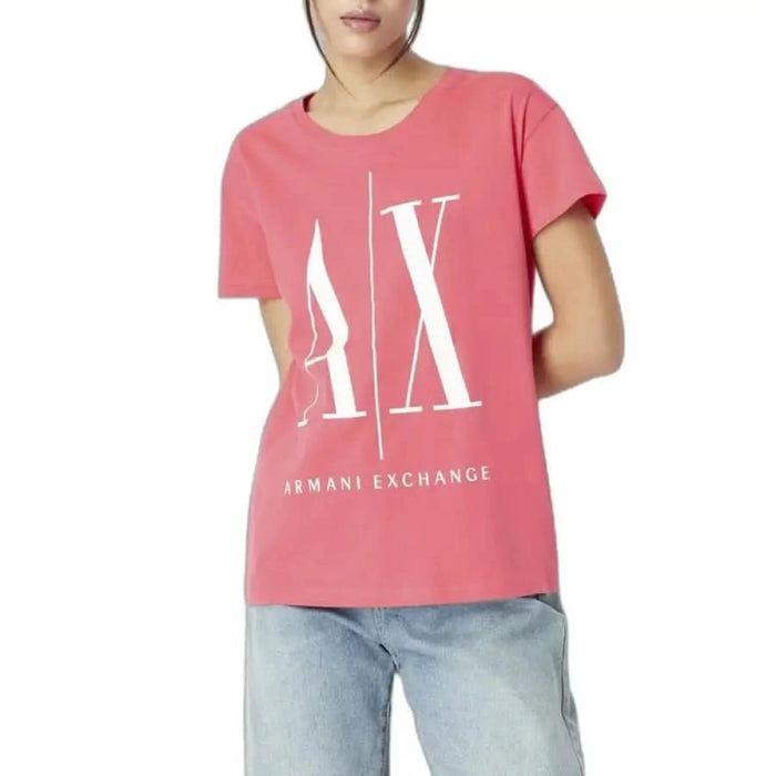 Pink Armani Exchange T-shirt with large ’AX’ logo for women. Stylish and trendy