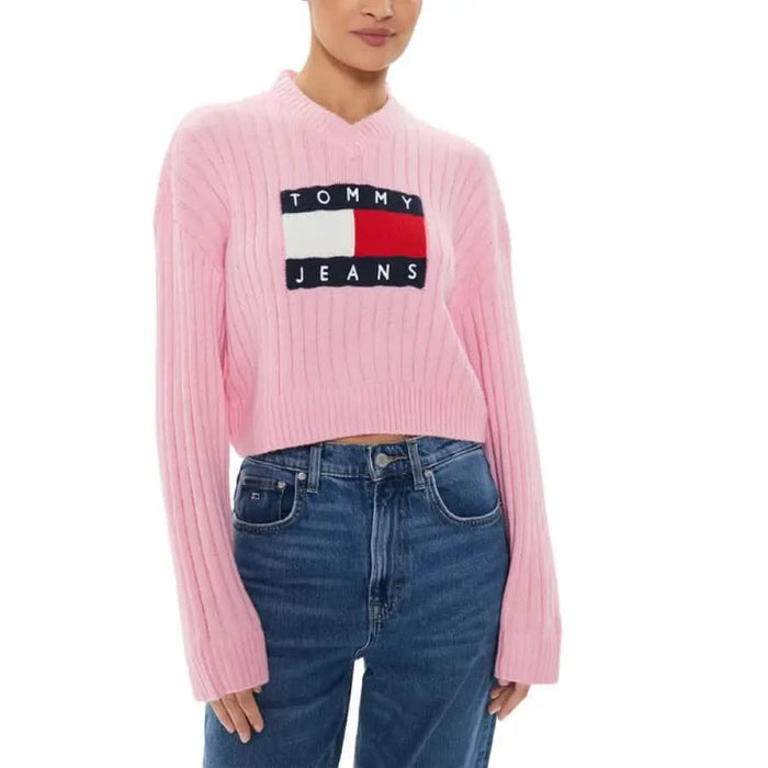 Pink cropped Tommy Jeans sweater with ribbed texture and logo patch from Tommy Hilfiger