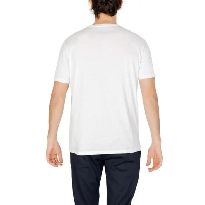 Person wearing Armani Exchange Men T-Shirt plain white facing away from the camera