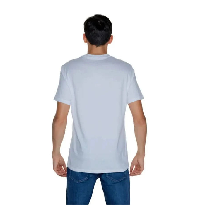 Guess Men T-Shirt in white worn by person facing away from the camera