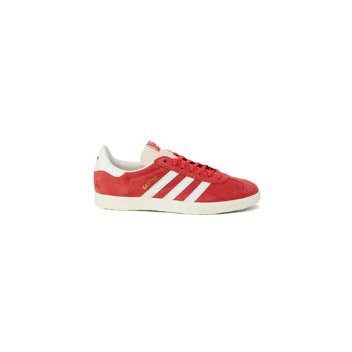 Red Adidas Gazelle sneaker featuring white stripes and sole in Adidas Men Sneakers collection