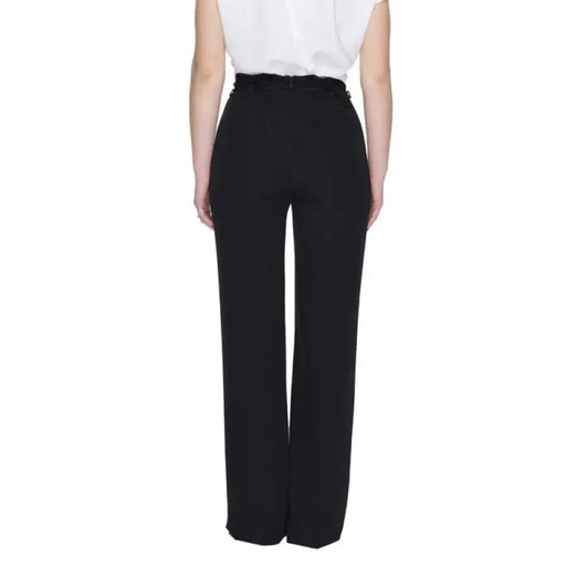 Sandro Ferrone women trousers featuring urban style clothing on the row black person