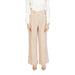 Vero Moda women wearing Vero Moda wide leg silk trousers