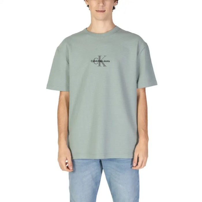 Sage green Calvin Klein t-shirt with logo graphic for men in Calvin Klein Jeans collection