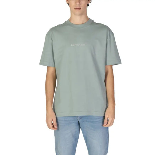 Sage green Calvin Klein Jeans men t-shirt featuring a minimal text design