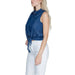 Jacqueline De Yong Women’s Sleeveless Blue Denim Shirt Tied at Bottom with White Pants