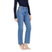 Straight-leg blue jeans with navy ribbed sweater and beige heels from Vero Moda