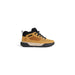 Tan and black Timberland hiking boot featuring the Timberland logo in men’s sneakers