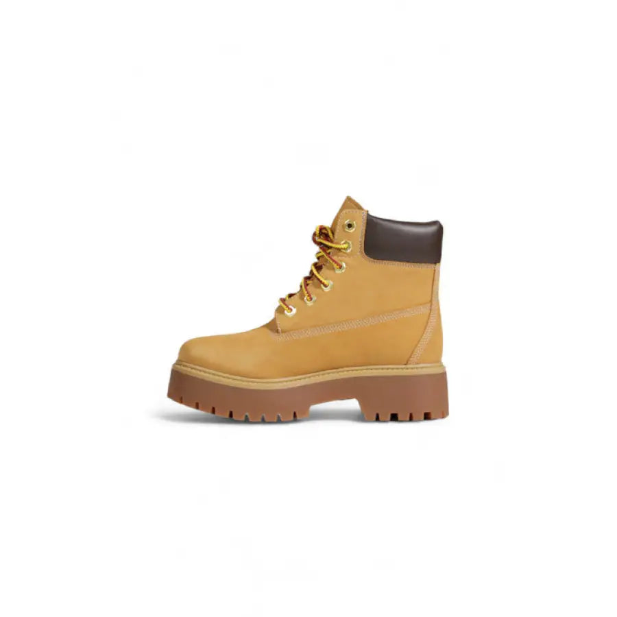 Tan leather work boot with thick rubber sole and dark brown collar - Timberland Women Boots