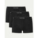 Three black Calvin Klein boxer briefs stacked neatly for stylish men’s underwear