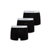 Three black Calvin Klein boxer briefs with white elastic waistbands for men