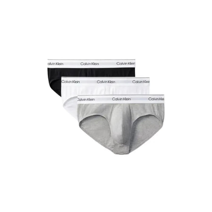 Calvin Klein men’s briefs in black, white, and gray displayed as part of Calvin Klein Underwear