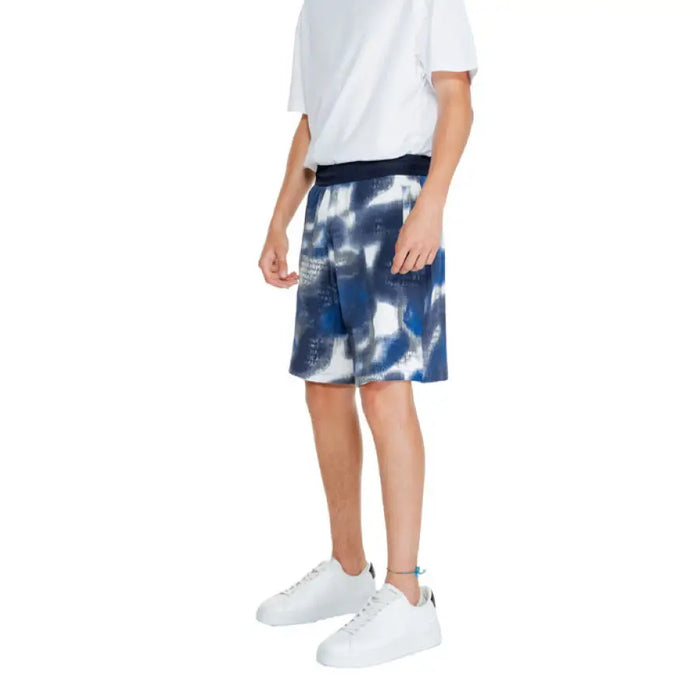 Tie-dyed blue denim shorts with a bleached pattern from Armani Exchange in cotton-lycra blend