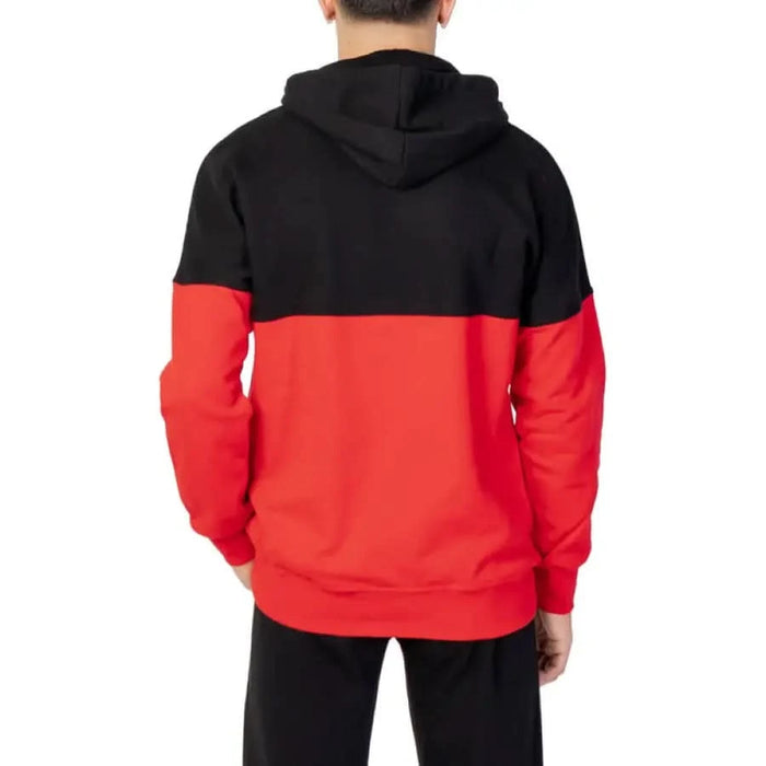 Back view of Pyrex Men Sweatshirts featuring black and red two-tone hooded design