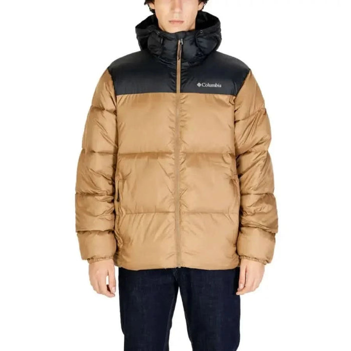 Two-tone puffy winter jacket by Columbia, tan and black with hood and logo