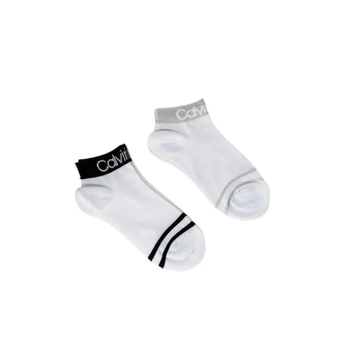 White Calvin Klein ankle socks featuring branding and stripe details for women