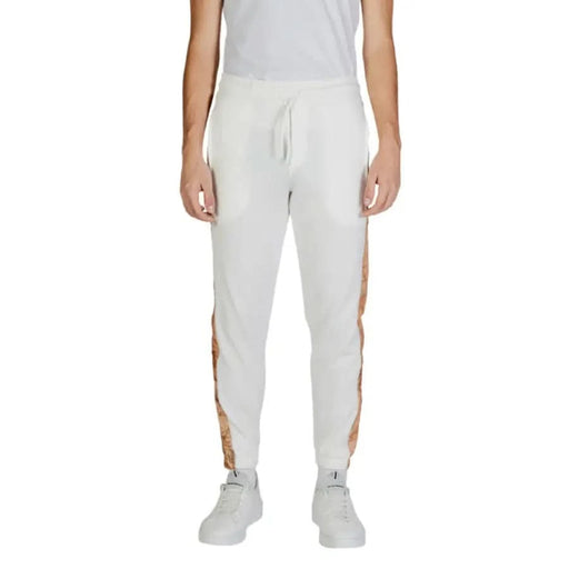 White athletic sweatpants with tan side stripes from Alviero Martini Prima Classe