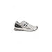 White and black New Balance athletic running shoe with mesh upper and cushioned sole