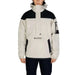 White and black Columbia pullover anorak jacket featuring a half-zip front