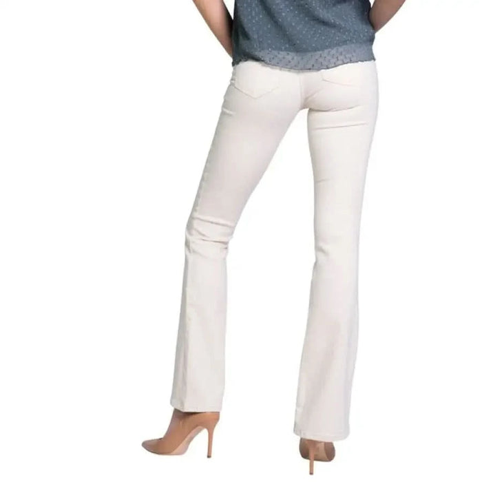 White bootcut jeans with nude heels by Only - Only Women Jeans