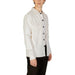 White button-up Hamaki-ho Men Shirt with dark buttons paired with black pants