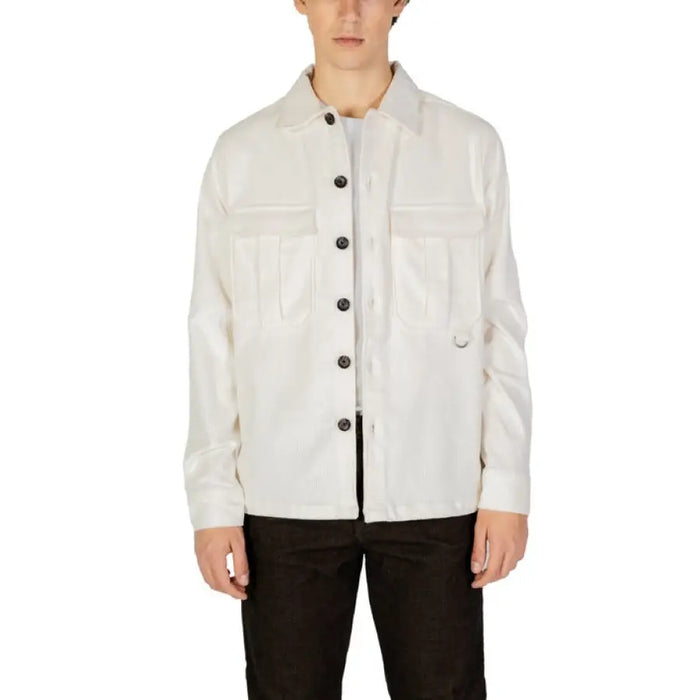 White button-up jacket with chest pockets and black buttons by Hamaki-ho for men