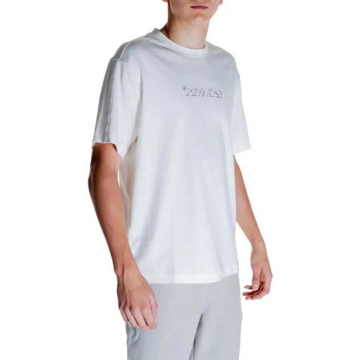 Person wearing White Calvin Klein Men T-Shirt from the Calvin Klein collection